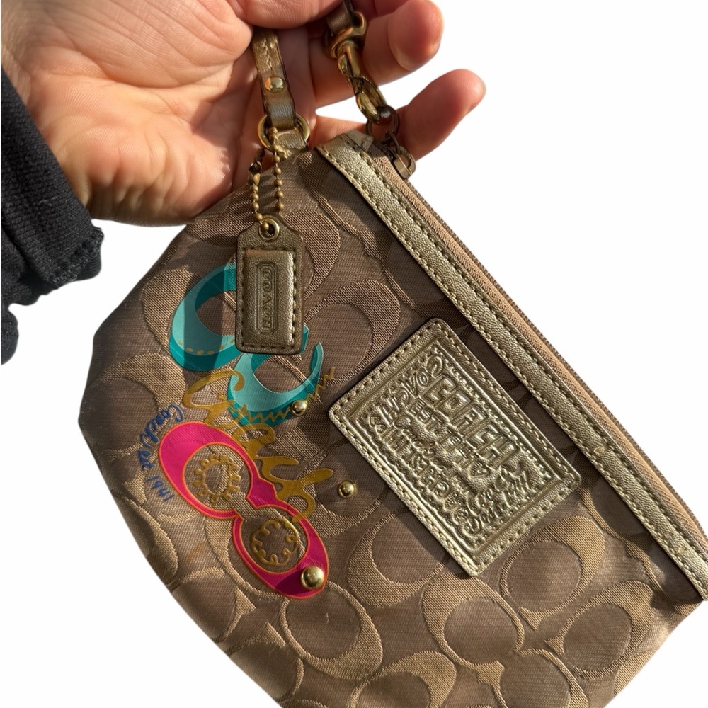 Coach Brown Wristlet with Gold and Pink Accents